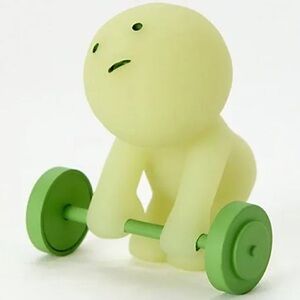 Urban Outfitters Green and Yellow Lifting Toy Figure